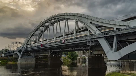 Passenger train fast running to the sunset,time lapse Stock Footage 135768139