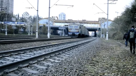 Passenger Train With Graffiti At The Camera With Two Turns Viewing Stock Footage 84864181