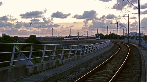 Passenger train is heading to the trainstation Stock Footage 66186233