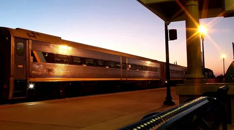 Passenger Train Heads into the Sunset Stock Footage 61500038