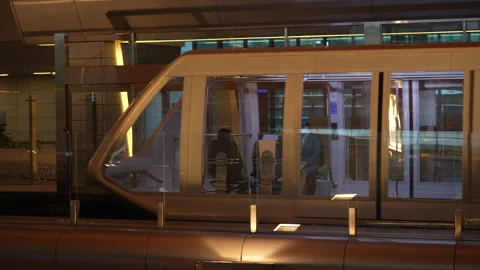 Passenger train inside in Hamad International Airport in Qatar, Doha Stock Footage 296894093