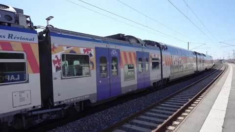 Passenger train leaving Stock Footage 220876180