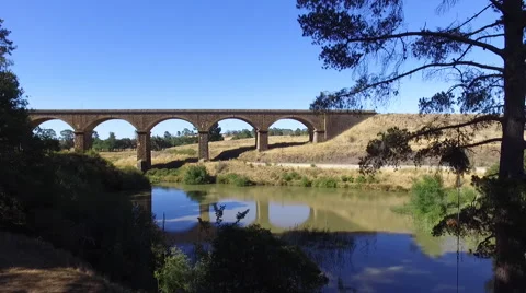 Passenger train on Malmsbury viaduct Stock Footage 58635264