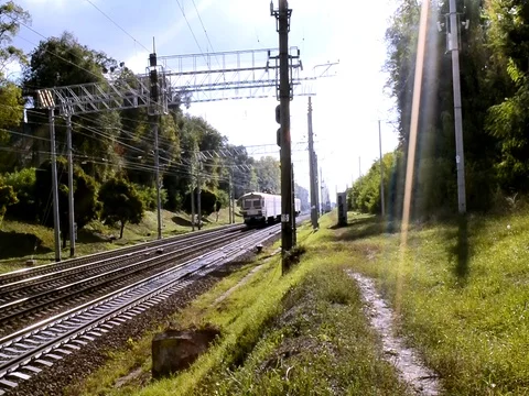 Passenger Train Move At The Camera Turn View In Sun Lights Stock Footage 84864171