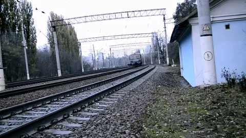 Passenger Train Moved Away On The Camera At Frontal View Stock Footage 84864198