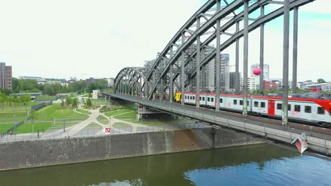 Passenger Train Moving On Railroad Bridge. Frankfurt City Bridge Stock Footage 236491189