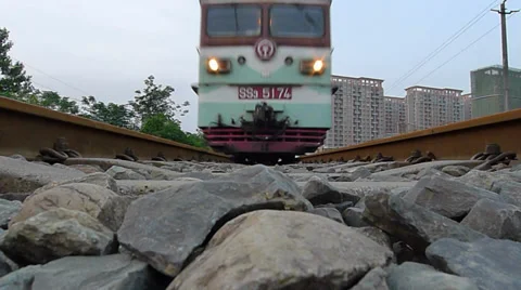 A passenger train is moving rapidly, video from the roadbed view Stock Footage 38739628