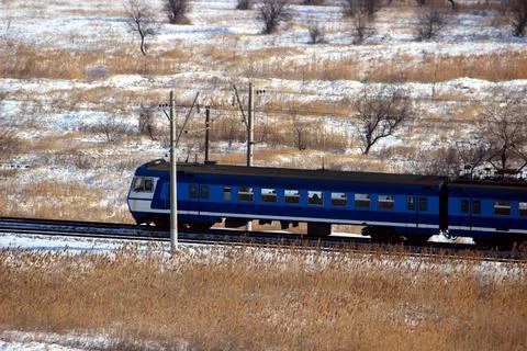 Passenger train or train goes by rail. Stock Photos