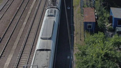 Passenger Train Passes The Station, View From The Copter Stock Footage 122850239