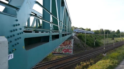 Passenger Train passes through the Bridge Stock Footage 39932245