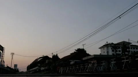 Passenger train passing by and leaving train station of Yogyakarta Stock Footage 130400258
