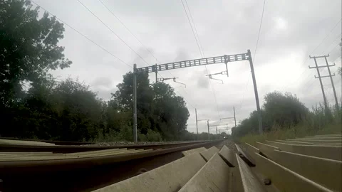 Passenger train passing close to camera Stock Footage 159006238