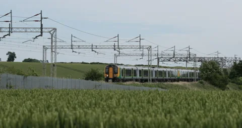 Passenger train passing  Stock Footage 137453578