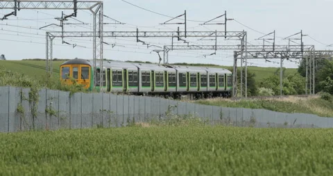 Passenger train passing  Stock Footage 137455896