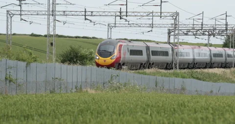 Passenger train passing  Stock Footage 137462081