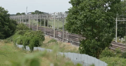 Passenger train passing  Stock Footage 137464320