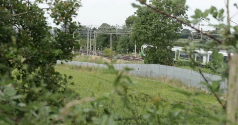 Passenger train passing  Stock Footage 137469092