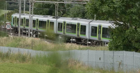 Passenger train passing  Stock Footage 137469579