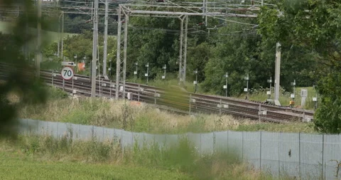 Passenger train passing  Stock Footage 137470422