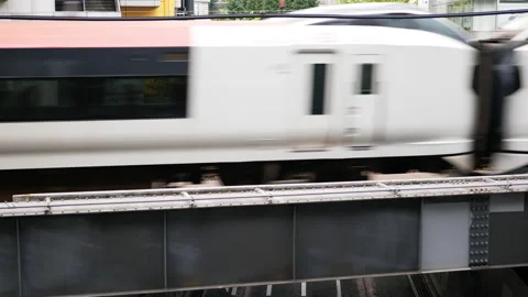 Passenger train passing Stock Footage 229249579