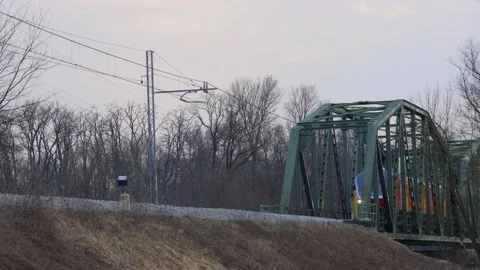 Passenger train passing through bridge Stock-Footage 151741326