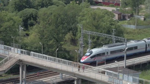 Passenger Train Passing Through The Station, Close. View From The Copter Stock Footage 122850847