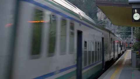 Passenger Train passing by, view from Station Platform in Corniglia Stock Footage 158511011