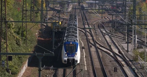 Passenger train passing Wuppertal marshalling yard, public transport Germany Stock Footage 96266638