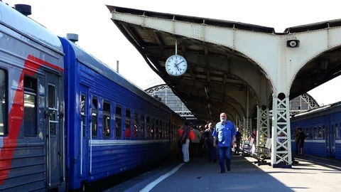 Passenger train at the platform of the station to land passengers Stock Footage 72519050