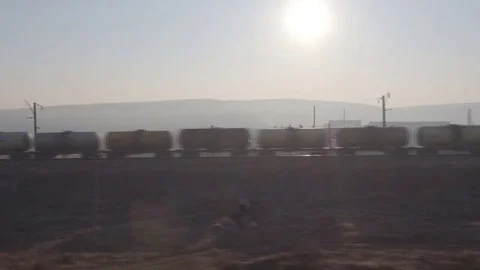 Passenger train on railway track Stock Footage 74861978