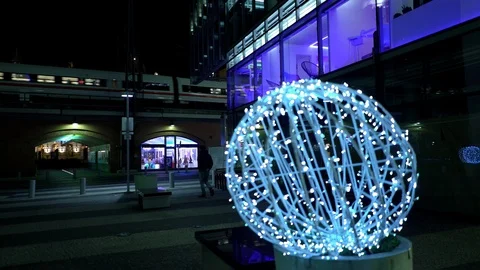 Passenger train reflected in a glass building. Night Berlin. On the bridge. Stock Footage 102263327