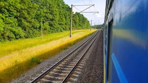 The passenger train returns to the left.The view from the window of the car, bus Stock Footage 111399917