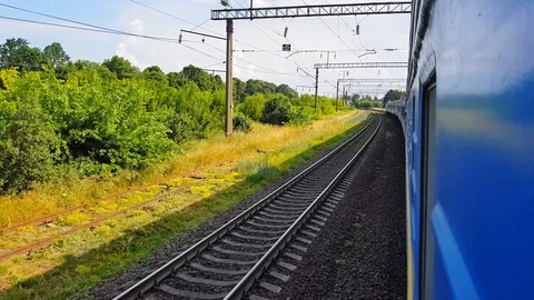 The passenger train returns to the left. The view from the window of the car Stock Footage 111400195