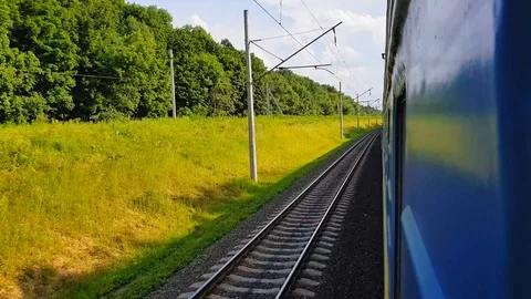The passenger train returns to the right. The view from the window of the car Stock Footage 111399972