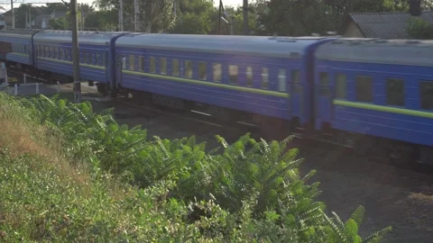 Passenger train rides by rail Stock Footage 139463101