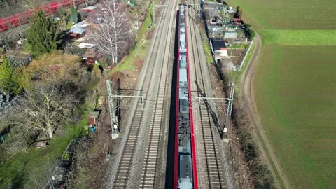 Passenger train rides on the railroad. Train travel concept. Top view Vídeos de archivo 244806245