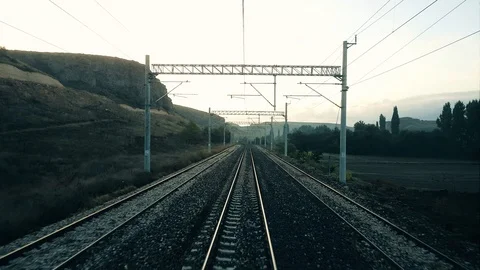 Passenger train slowing down and stops on the railroad Stock-Footage 95701052