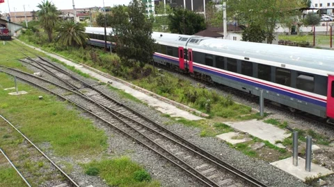 PASSENGER TRAIN STARTS JOURNEY Stock Footage 238615663