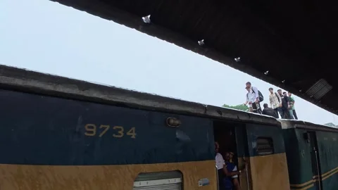 Passenger Train Stopped at Railway Platform in Bangladesh Stock Footage 341641119