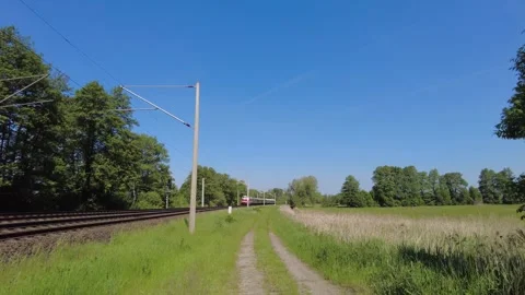 A passenger train straight out of the old days, pulled by a diesel locomotive. Stock Footage 335519950