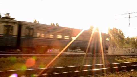 Passenger Train In Sunny Shine On The Camera At Frontal View Stock Footage 84864191