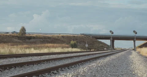 Passenger train travelling from a high angle shoot at Israel Stock Footage 62263257
