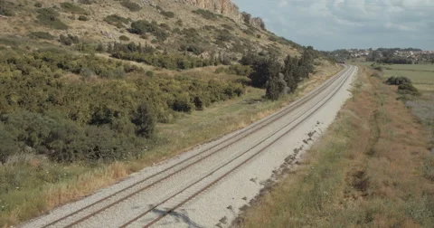 Passenger train travelling from a high angle shoot at Israel Stock Footage 62263406
