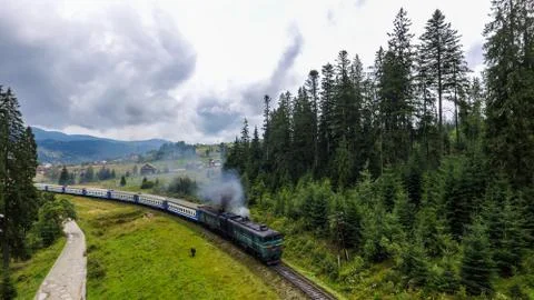 Passenger train in the Ukrainian Carpathians. Stock Photos