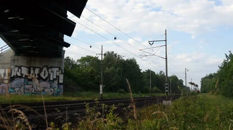 Passenger Train Under the Bridge Stock Footage 51340706