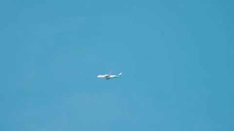 Passenger transportation developing across global air routes at high altitude. Stockbeeldmateriaal 328358560