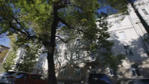 Passenger view from car looking up at passing buildings in Odessa Ukraine Europe Stock-Footage 122546120