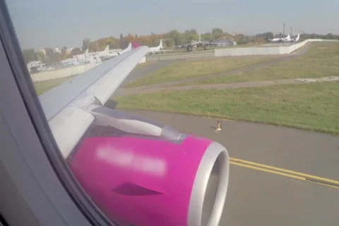 Passenger view inside airplane liner steel wing turbine steering, click for HD Stock Footage 43967070