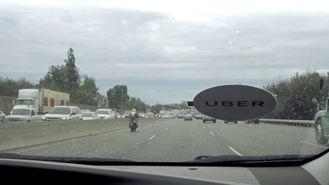 Passenger view of Uber windshield on highway in Los Angeles California Stock Footage 70611199