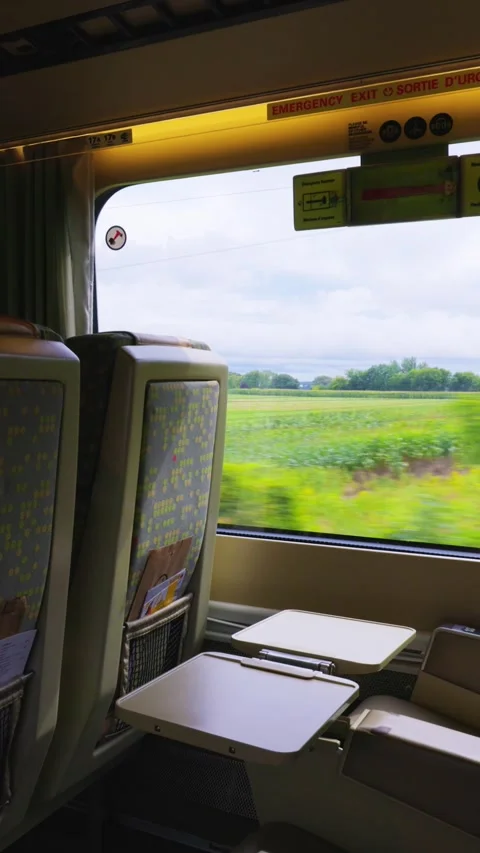 Passenger window seats in a fast first class intercity Via Rail train commuting Video stock 297416147